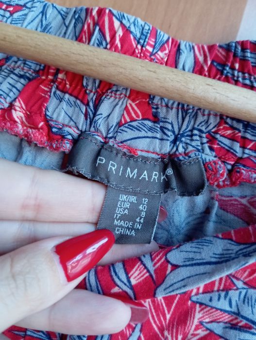 Spodnie w kwiaty z kieszeniami, primark