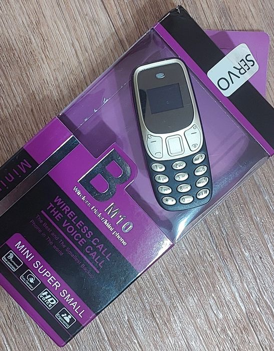 (НОВЫЙ) Двухсимочный мини телефон bluetooth гарнитура Servo BM10