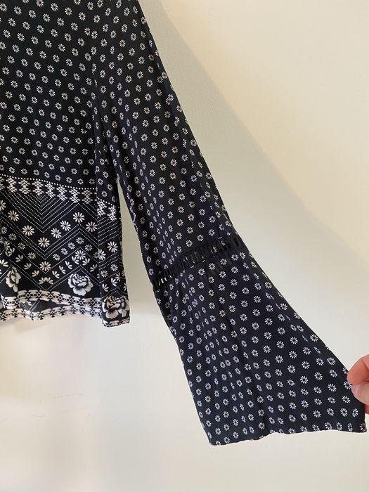 Blusa  estamoada com manga