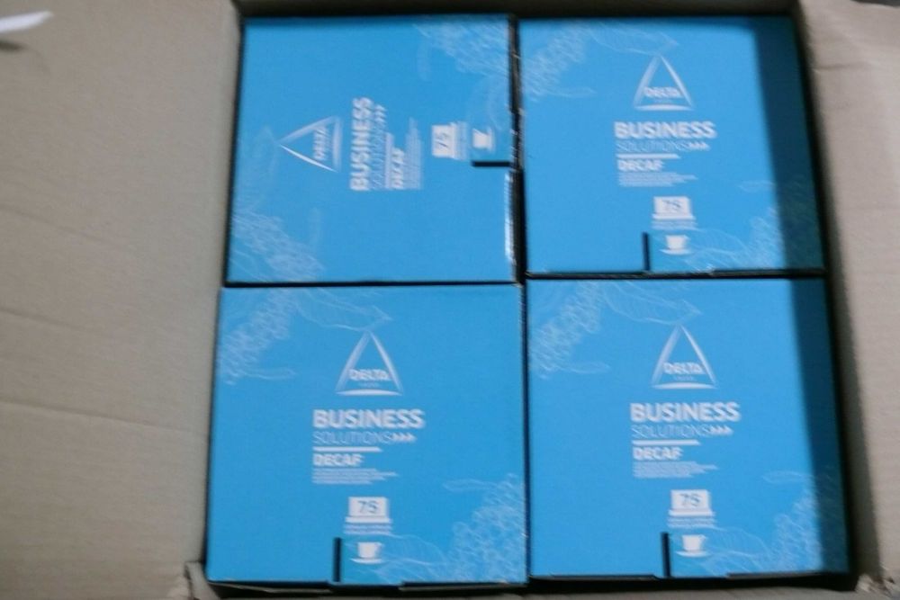 Caixa de cápsulas de café Delta Business Solutions.