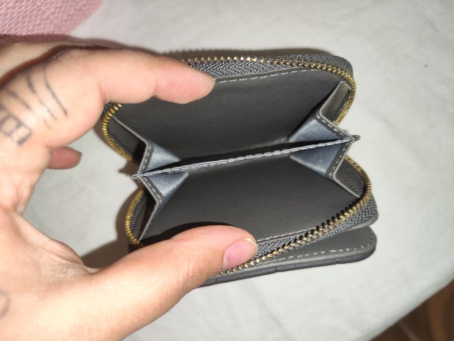 Porta moedas igual a novo