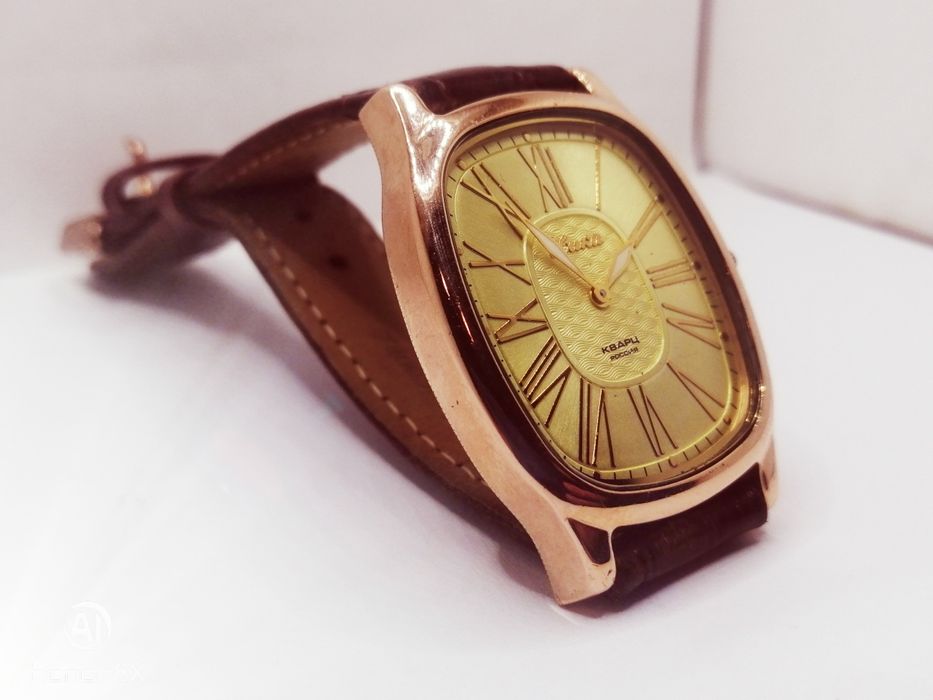 Золотые часы Ника