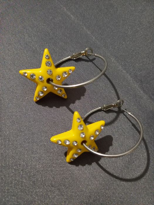 Brincos estrela amarelos
