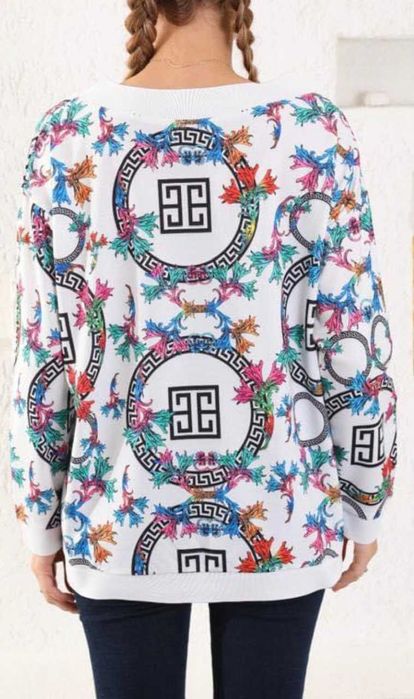 Bluza dekolt V wzory 42/44/46 R. UNIWERSALNY biała