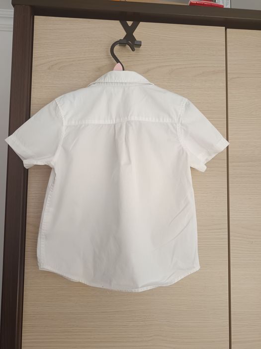 Biała koszula chłopięca marki h&m rozm 104