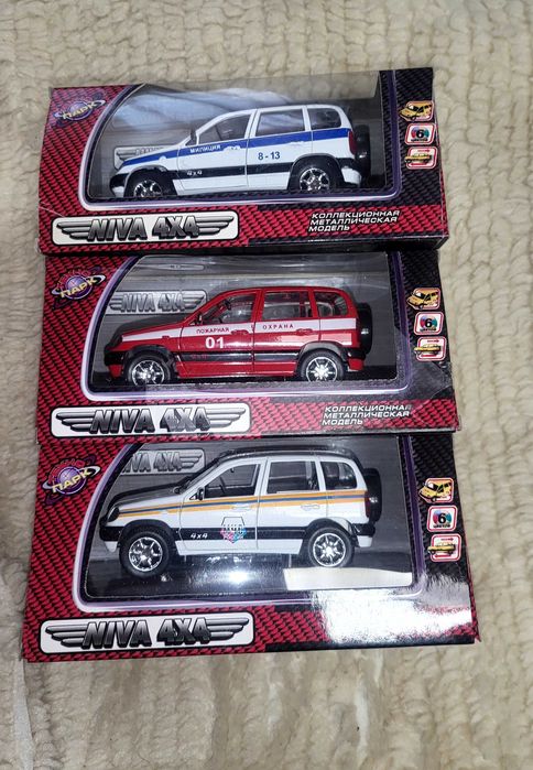 Машинка метал, упаковка, Нива 4+4,статуэтка, sharp,14,года