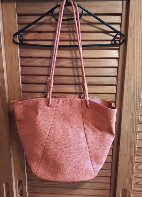 Mala alaranjada mulher