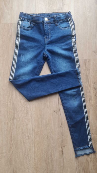 Spodnie jeansowe dziewczęce 140