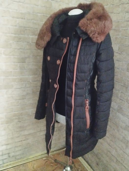 Теплий та зручний пуховик