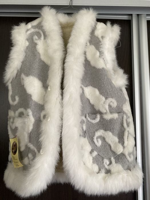 Безрукавка 38 розміру