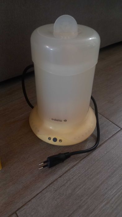 Aquecedor de biberões Medela