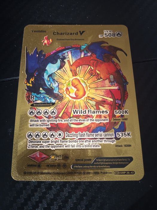 Złota karta pokemon Charizard HP 508