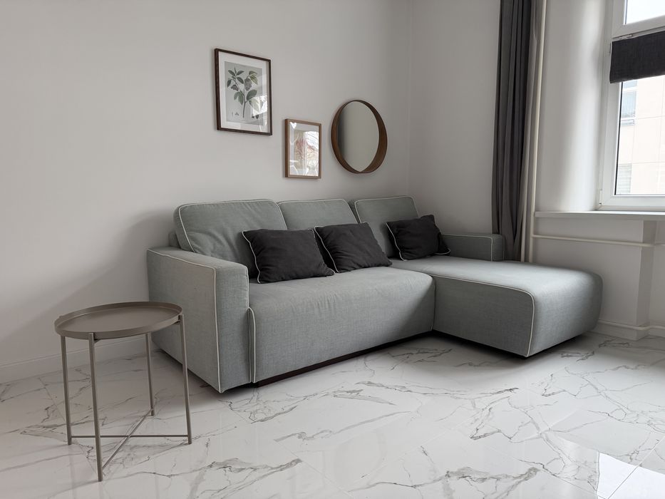 Sprzedam rozkładaną kanapę z dodatkowym pojemnikiem na pościel