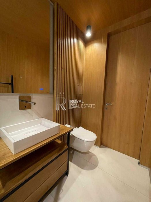 Продаж Будинок Бучанський район КМ «Белгравія» 280 м² 3 спальні Басейн Тераса 100 м² Сауна Джакузі Розумний дім Гараж