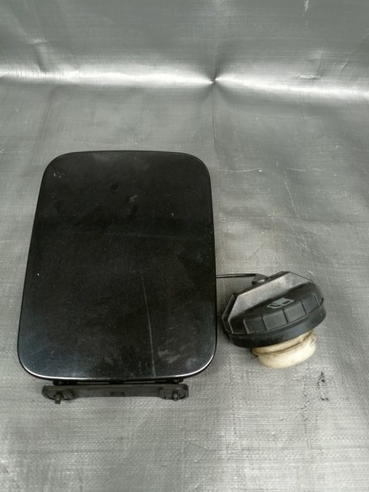 Chevrolet Aveo 1, 4 B sedan klapka wlewu paliwa,+ korek