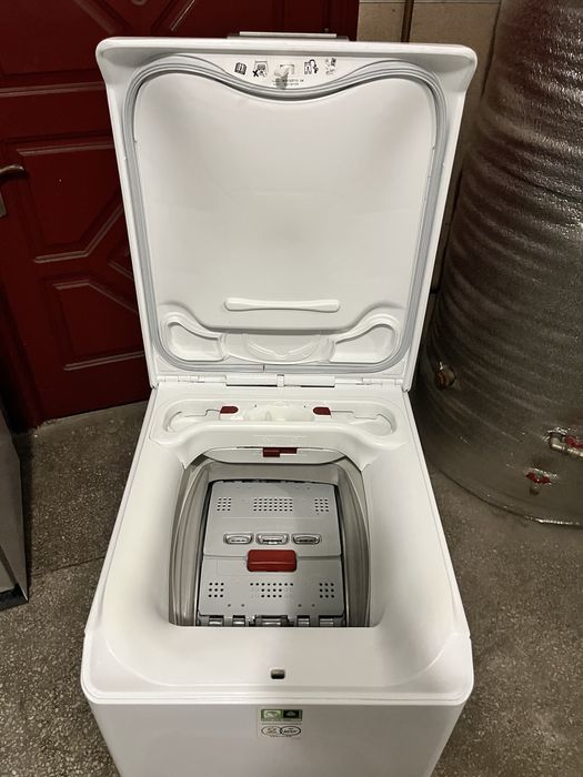 Вертикальна пральна машина AEG 7000 Series 1-7 кг