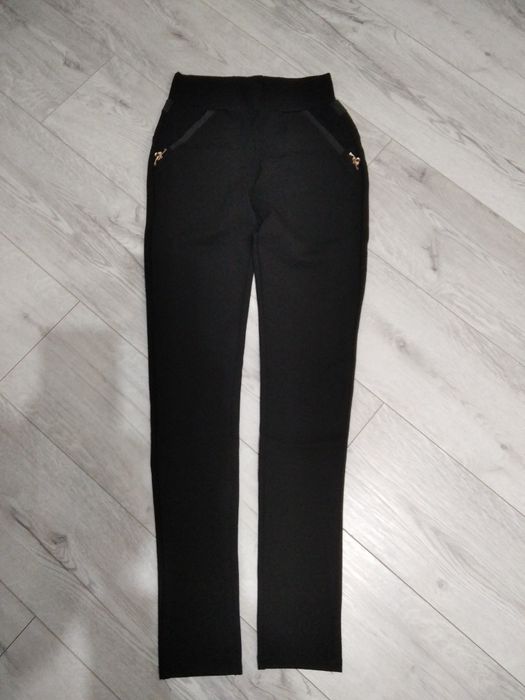 Nowe materiałowe spodnie rozm s