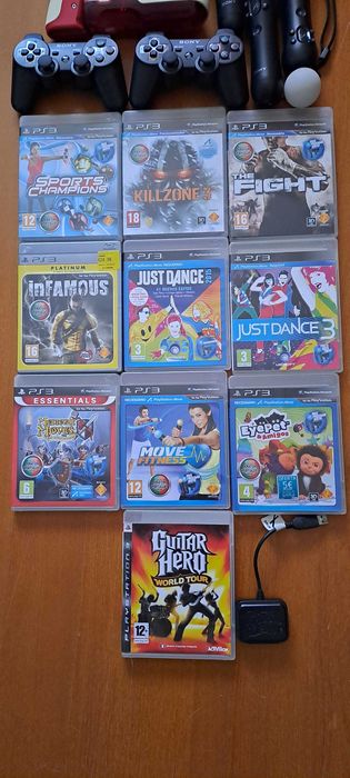 PS3 com jogos, comandos e câmara