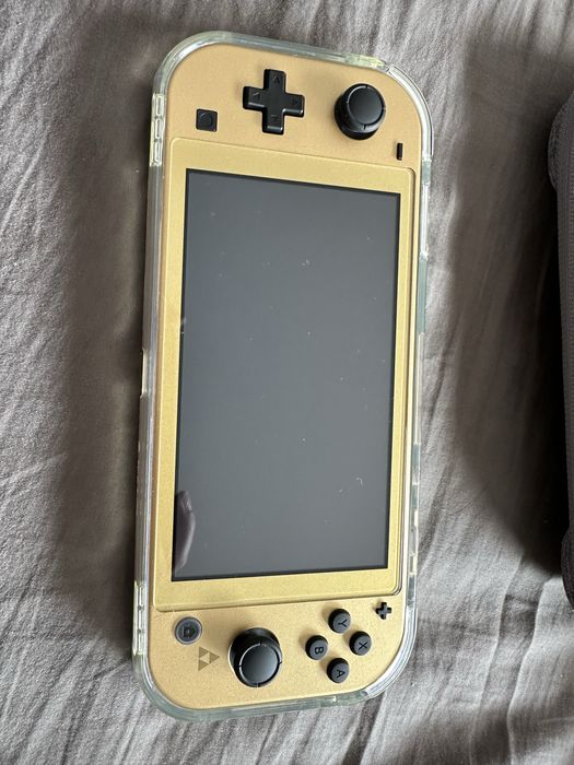 Nintendo Switch Lite Zelda + 128GB Card + Case + Case64171760267651120