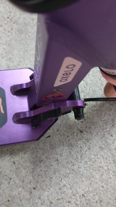 Trotinete lilas como nova