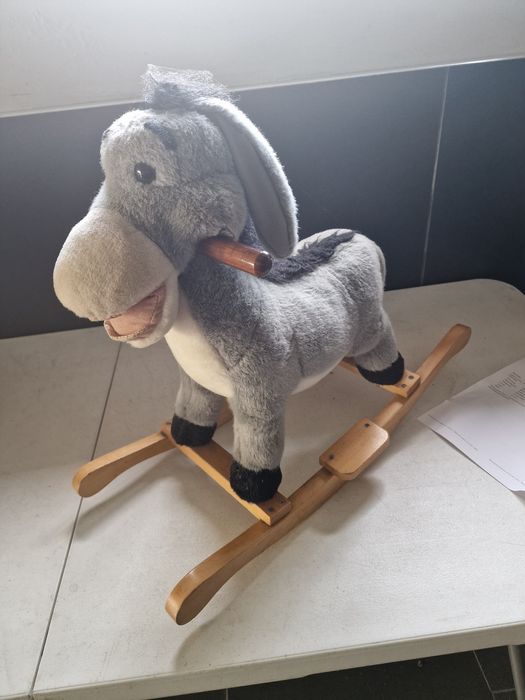 Boneco para  criança  baloiçar