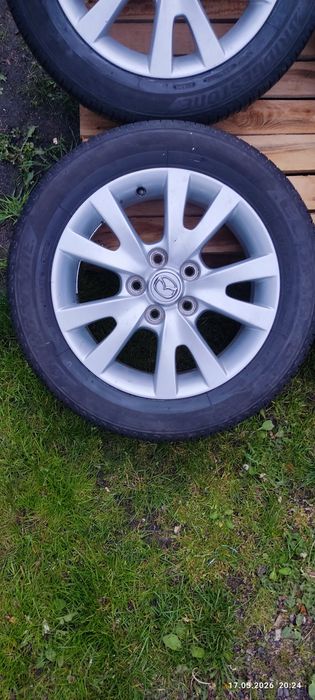 Felgi alu oryg Mazda 5x114,3 z oponami letnimi Bridgestone 205/55 R16, 4szt