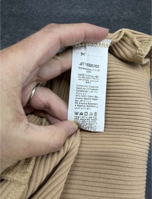 Бавовняне бежеве боді в рубчик