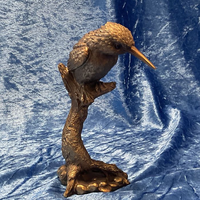 Ave escultura Guarda rios pintura a cor de ouro alt. 18 cm