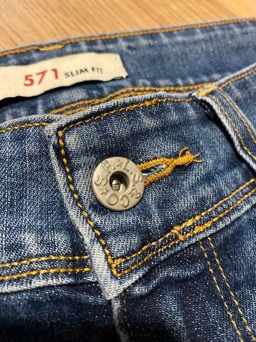 Spodnie damskie jeansowe Levis 571 slim fit niebieski denim 29x30 styl