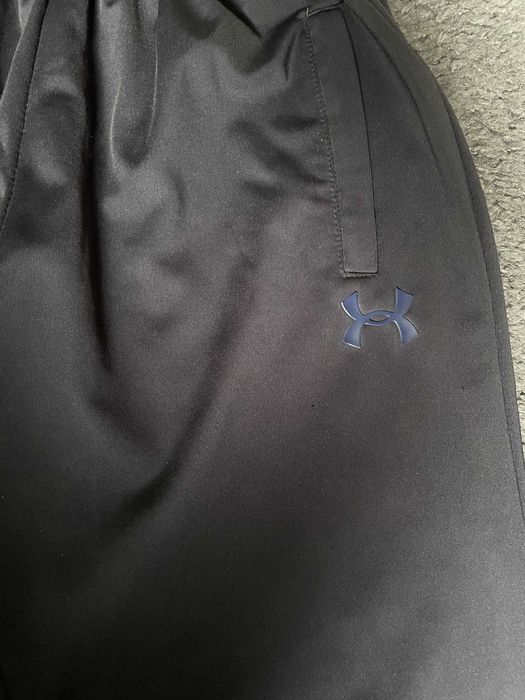 Sportowe spodnie UNDER ARMOUR rozm. M