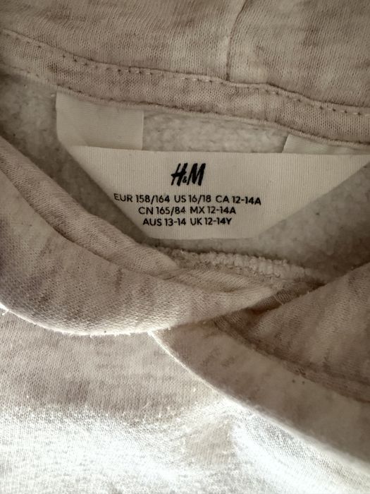 Dres firmy H&M r.164 kolor bezowy