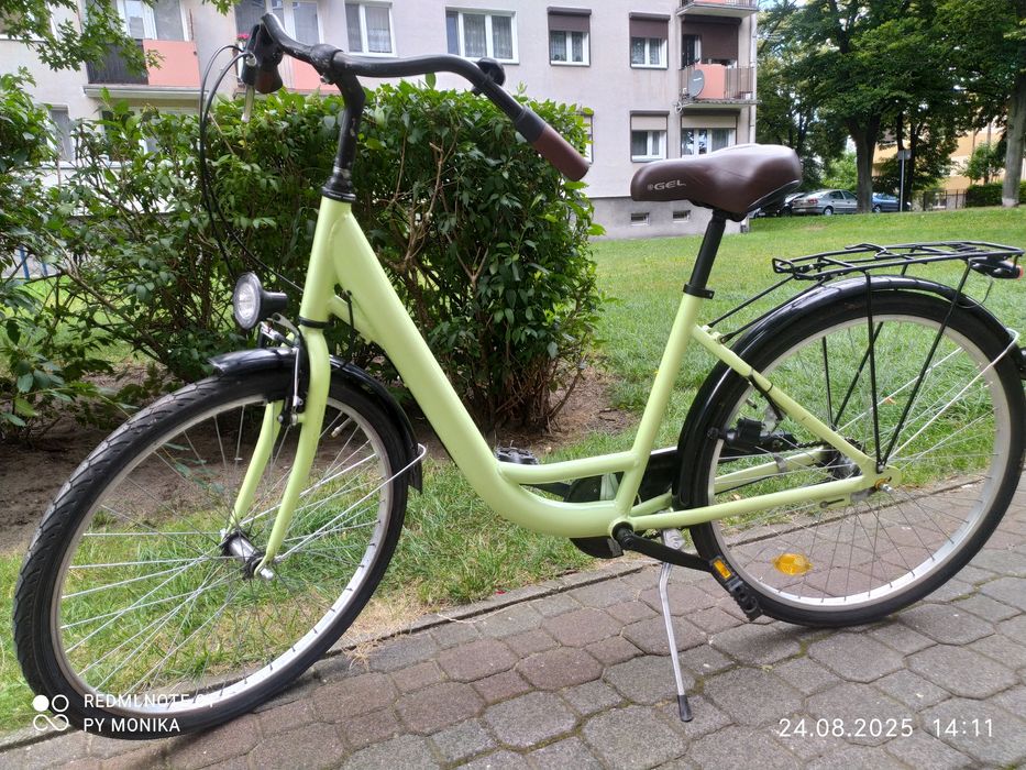 Sprzedam rower damski miejski kolor zielony, manietki i siodełko brąz