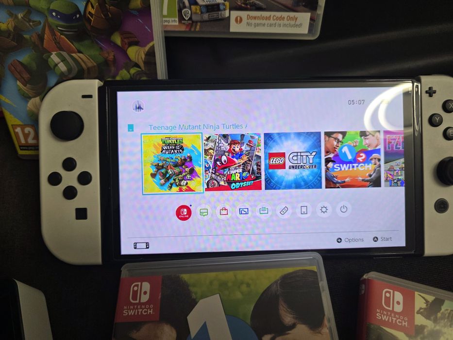 Nintendo switch Oled + 4 gry