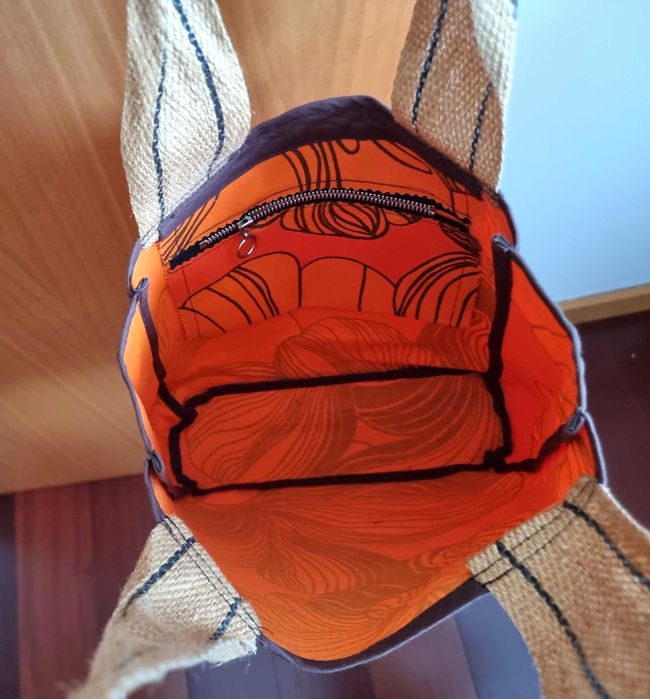 Mala/ saco laranja e castanho com padrão florido