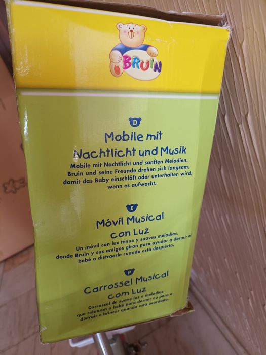 Brinquedo para cama de bebé