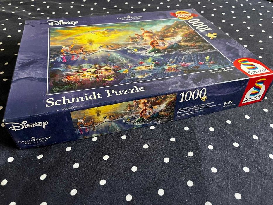 Puzzle Schmidt - Disney por Thomas Kinkade: 1000 peças; 4x 500 peças (Pequena Sereia, Aristogatos, Pocahontas, 101 Dálmatas, Rei Leão, Peter Pan)
