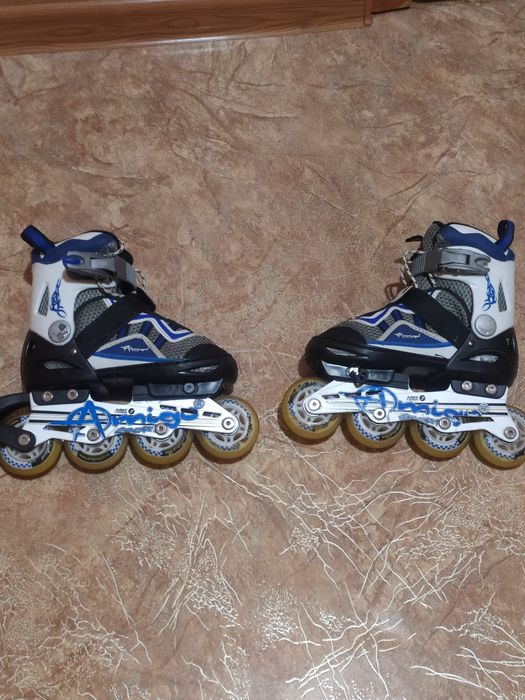 Роликовые коньки