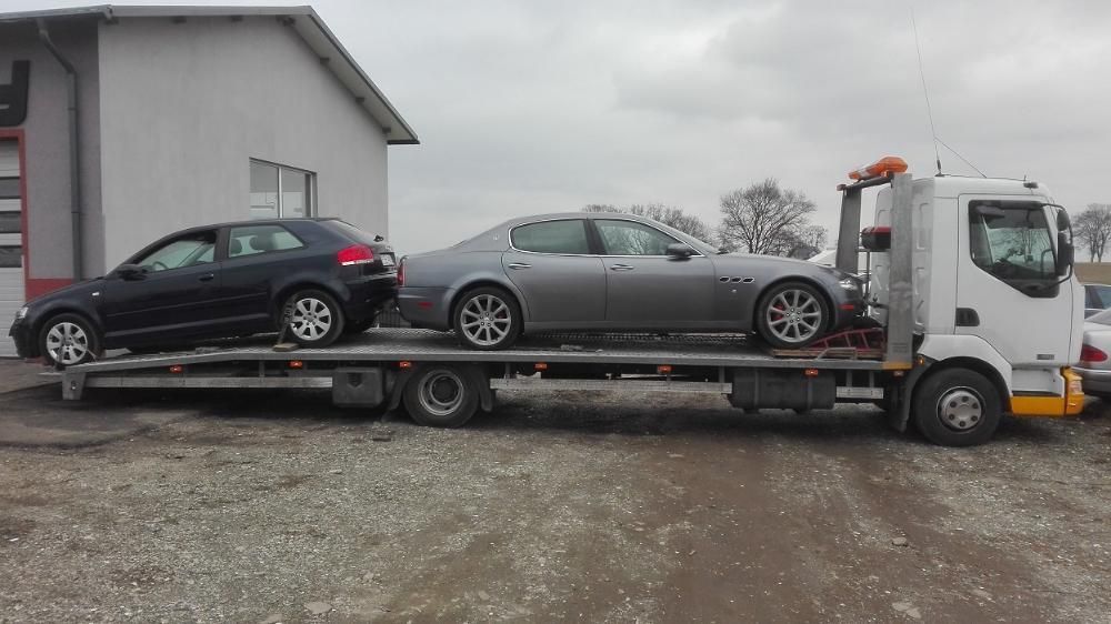 pomoc drogowa laweta holownik koparka widlak traktor bus przyczepa