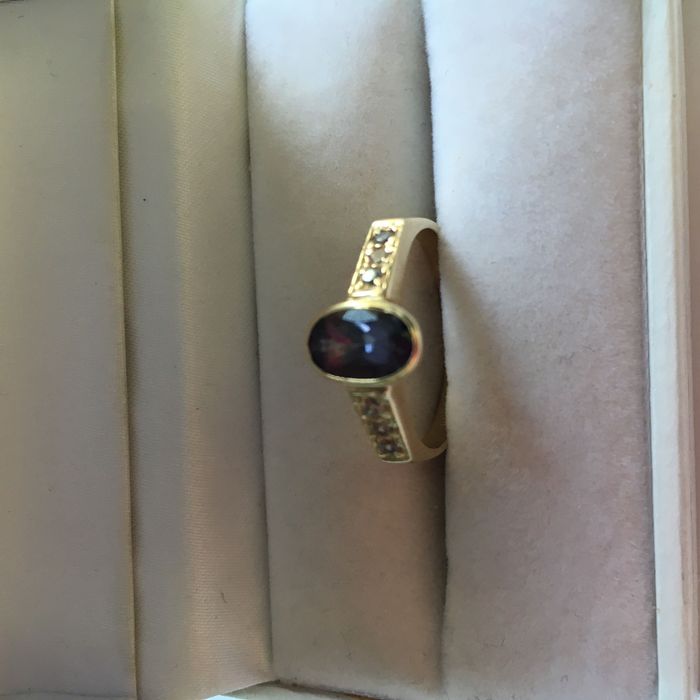 Złoty pierścionek z tanzanitem