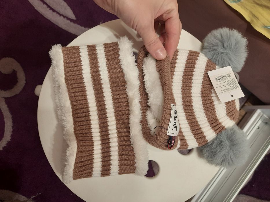 Продам зимову шапочку