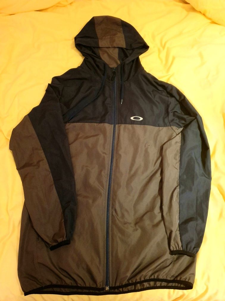 Corta vento oakley store marrom