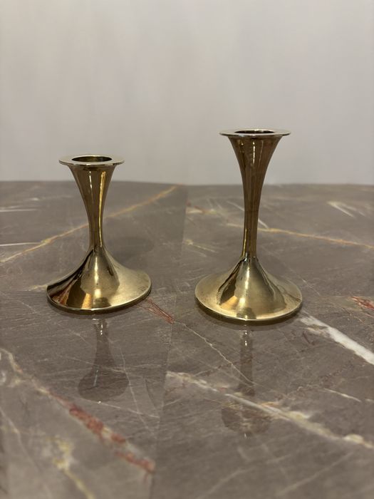 Zestaw z 2 świeczników. Mosiądz