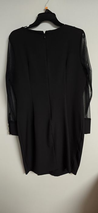 Nowa elegancka sukienka 44