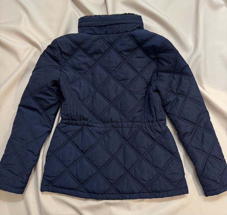 Демисезонная  куртка Тu