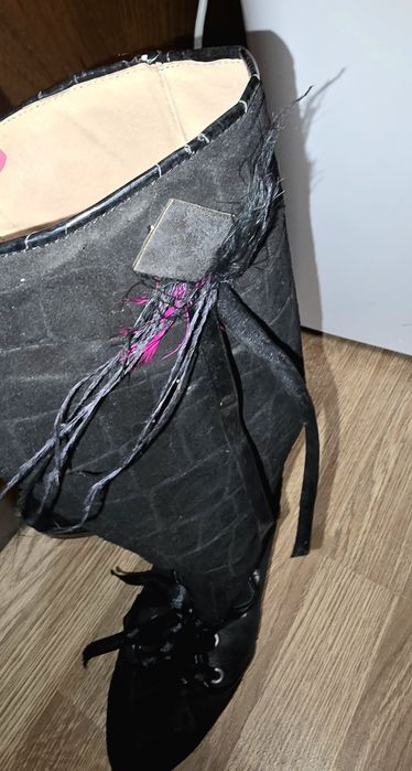 Botas de marca em pele