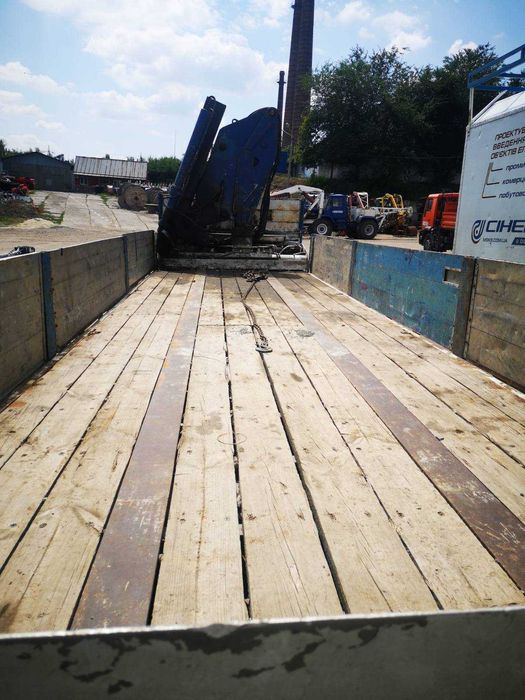 Бортовий напівпричіп Trailer S38.3 EL з маніпулятором PM-350