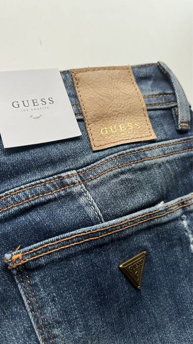 Guess niebieskie jeansy z dziurami W81AJ2D2ZI0 25 L30