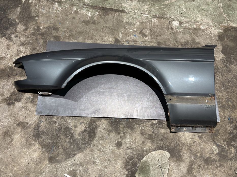 Błotnik lewy przód BMW E32 delphin