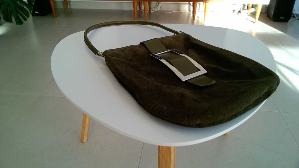 zielona torebka skórzana