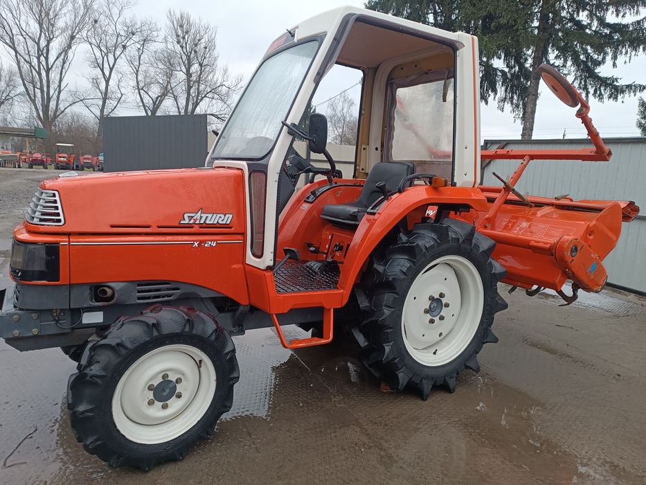 Японський мінітрактор . Трактор Кубота.